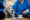 Care assistant supporting client with pet care in Lancashire